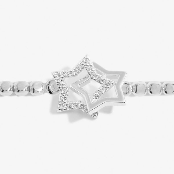 Silver stretch bracelet with star shaped charm