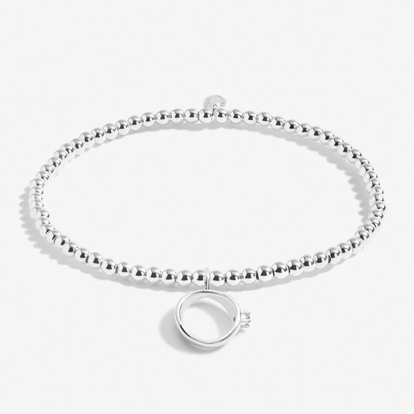 Silver plated beaded stretch bracelet with ring charm