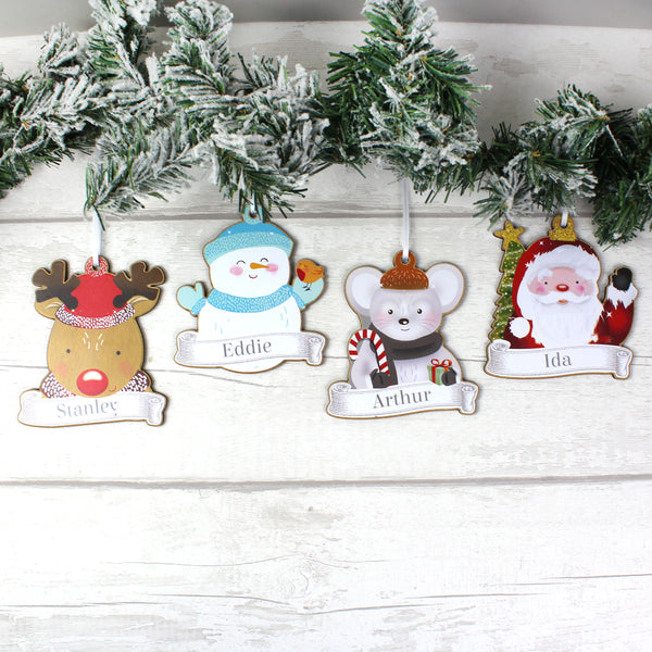 Set of four wooden personalised character Christmas decorations