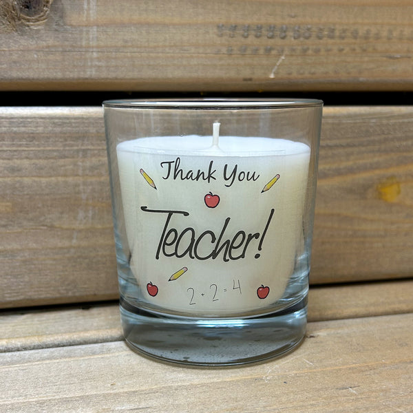 This scented candle in jar featuring the sentiment 'Thank You Teacher' comes in it's own gift box and makes the perfect gift. All of our candles from DeKassa Fine Fragrance are hand blended and hand poured in their workshop based in Scotland using the finest quality mineral and vegetable wax. Vegan friendly