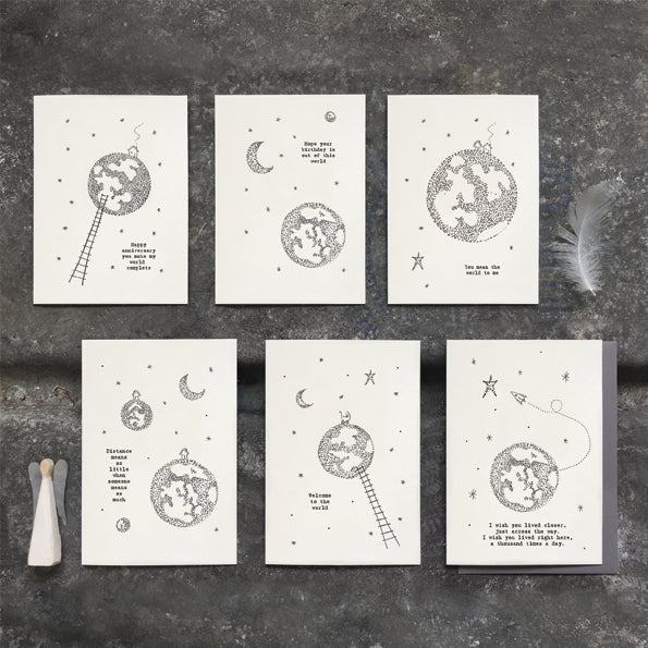  ***Price Includes Delivery ***   This East of India out of this world anniversary card features the greeting:  'Happy anniversary you make my world complete.'  With a pretty world illustration and blank inside for your own message.