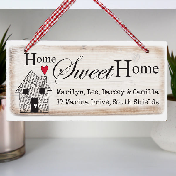 Wooden Hanging plaque which can be personalised with any message over two lines of 30 characters. 'Home Sweet Home' is fixed text.