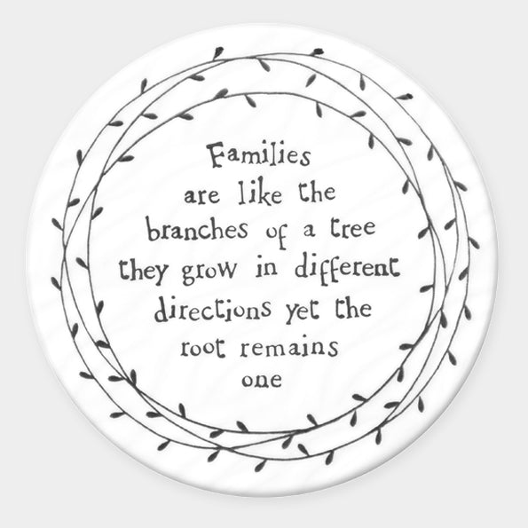 White porcelain coaster with black text - families