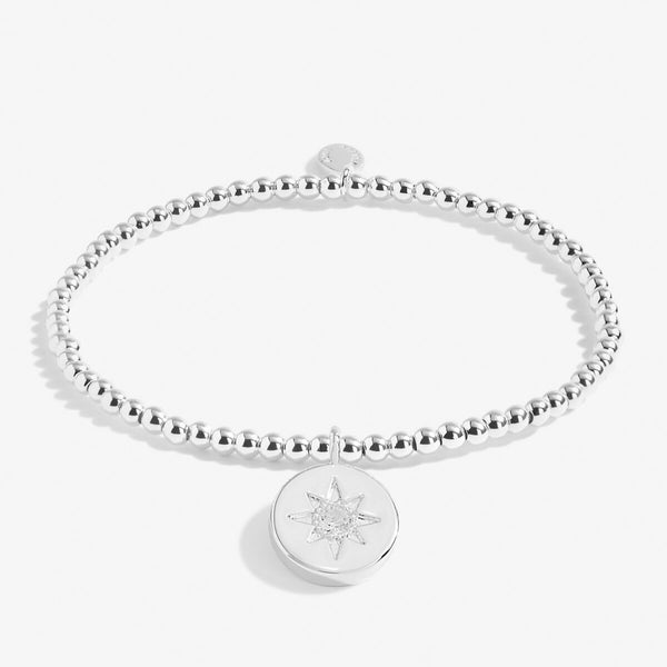 Silver beaded bracelet with charm