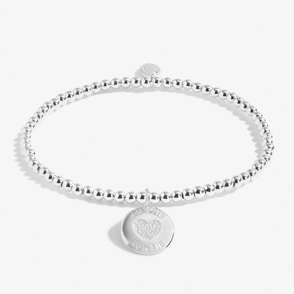 Silver beaded stretch bracelet with charm