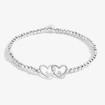 Silver beaded bracelet with heart charm