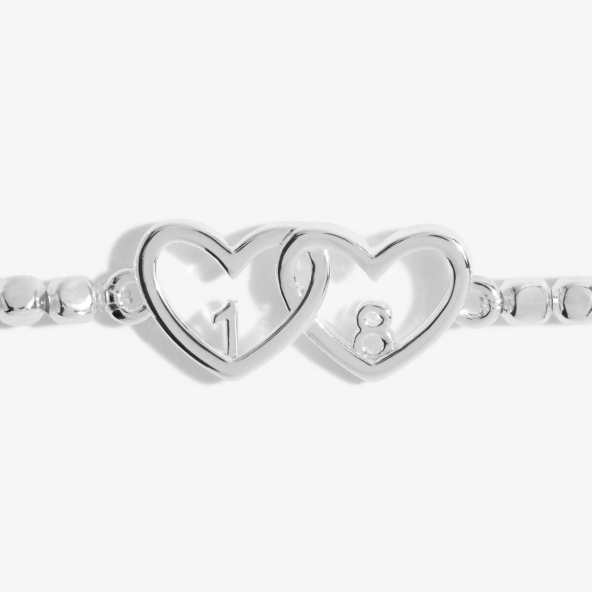Silver beaded bracelet with heart charm