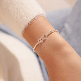Silver beaded bracelet with heart charm