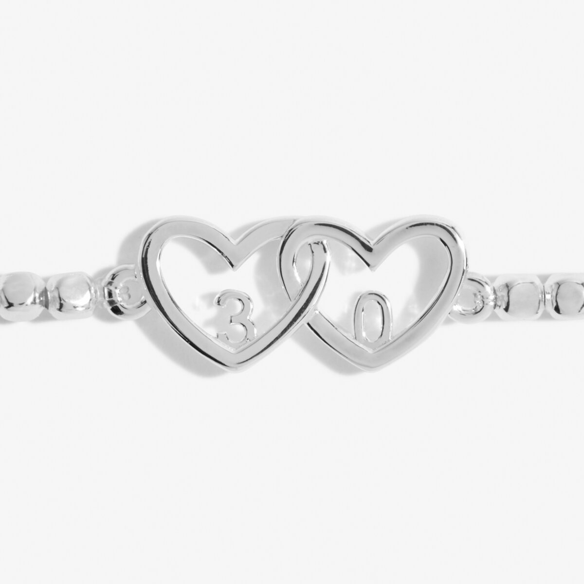 Silver beaded bracelet with heart charm