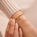 Gold plated Joma jewellery bracelet with hanging heart charm