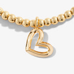 Gold plated Joma jewellery bracelet with hanging heart charm