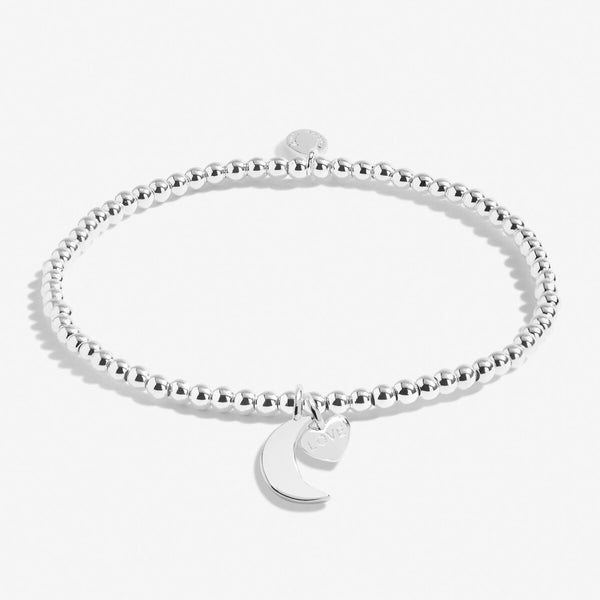 Silver plated beaded stretch bracelet with moon charm