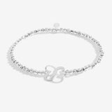 Silver plated beaded stretch bracelet with heart charm