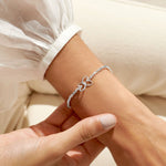 Silver plated beaded stretch bracelet with heart charm