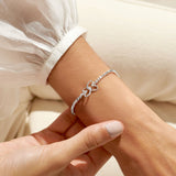Silver plated beaded stretch bracelet with heart charm