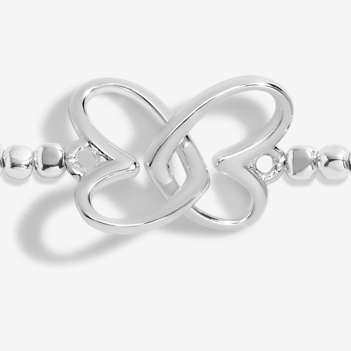 Silver plated beaded stretch bracelet with heart charm