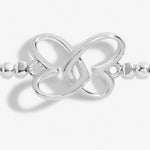 Silver plated beaded stretch bracelet with heart charm