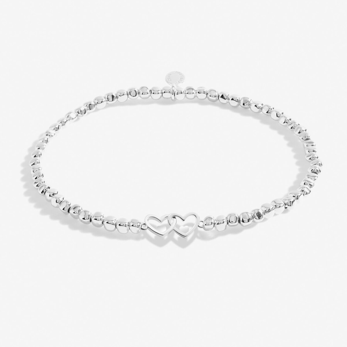 Silver plated beaded stretch bracelet with heart charm