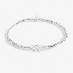 Silver plated beaded stretch bracelet with heart charm