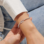Silver plated beaded stretch bracelet with heart charm