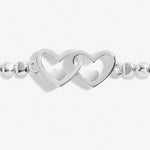 Silver plated beaded stretch bracelet with heart charm
