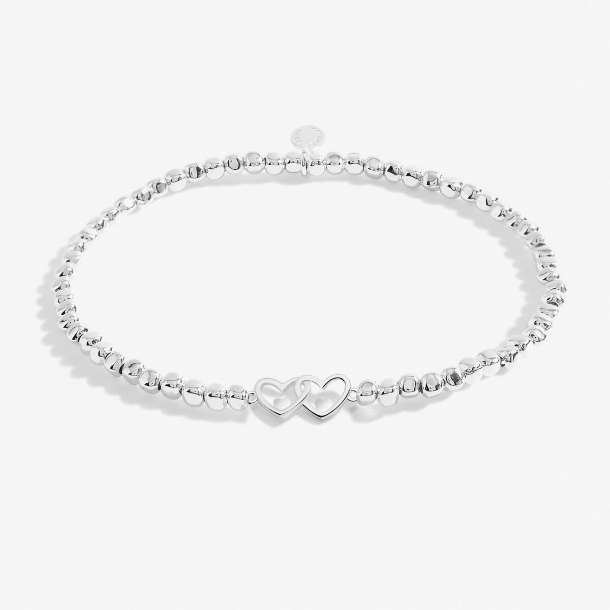Silver plated beaded stretch bracelet with heart charm