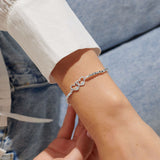 Silver plated beaded stretch bracelet with heart charm