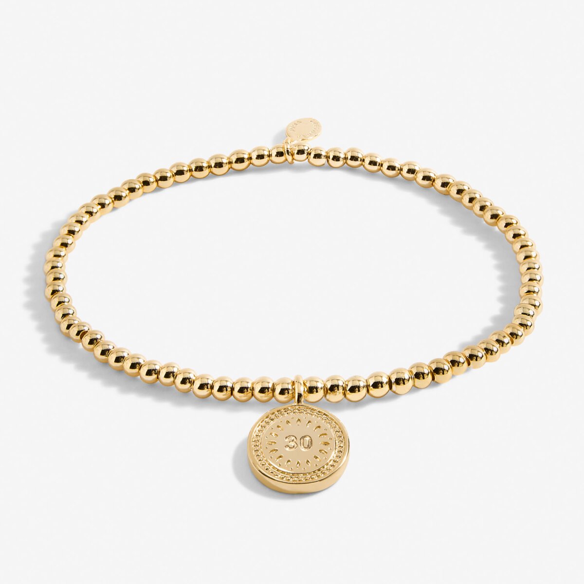 Gold plated beaded bracelet with charm