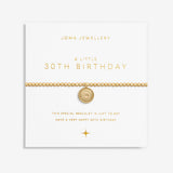 Gold plated beaded bracelet with charm