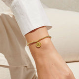 Gold plated beaded bracelet with charm