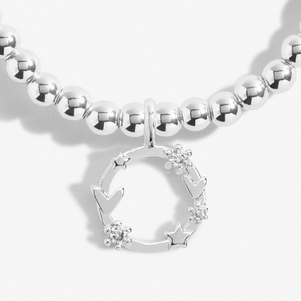 Silver plated beaded stretch bracelet with hoop charm