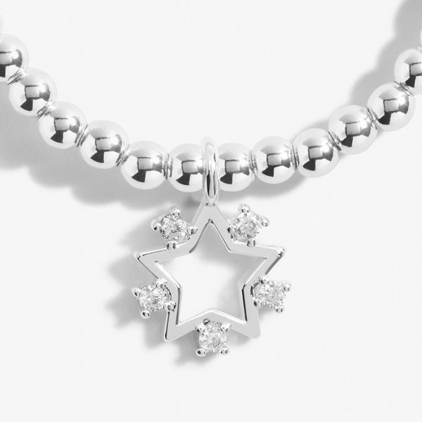 Silver plated beaded stretch bracelet with star charm