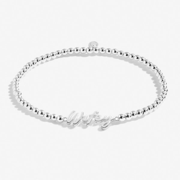 Silver plated beaded stretch bracelet with charm