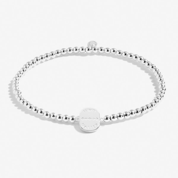 Silver plated beaded stretch bracelet with charm