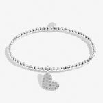 Silver plated beaded stretch bracelet with heart charm