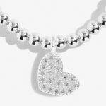 Silver plated beaded stretch bracelet with heart charm
