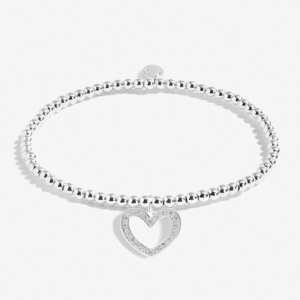 Silver plated beaded stretch bracelet with heart charm