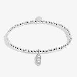 Joma beaded bracelet with peas in a pod charm