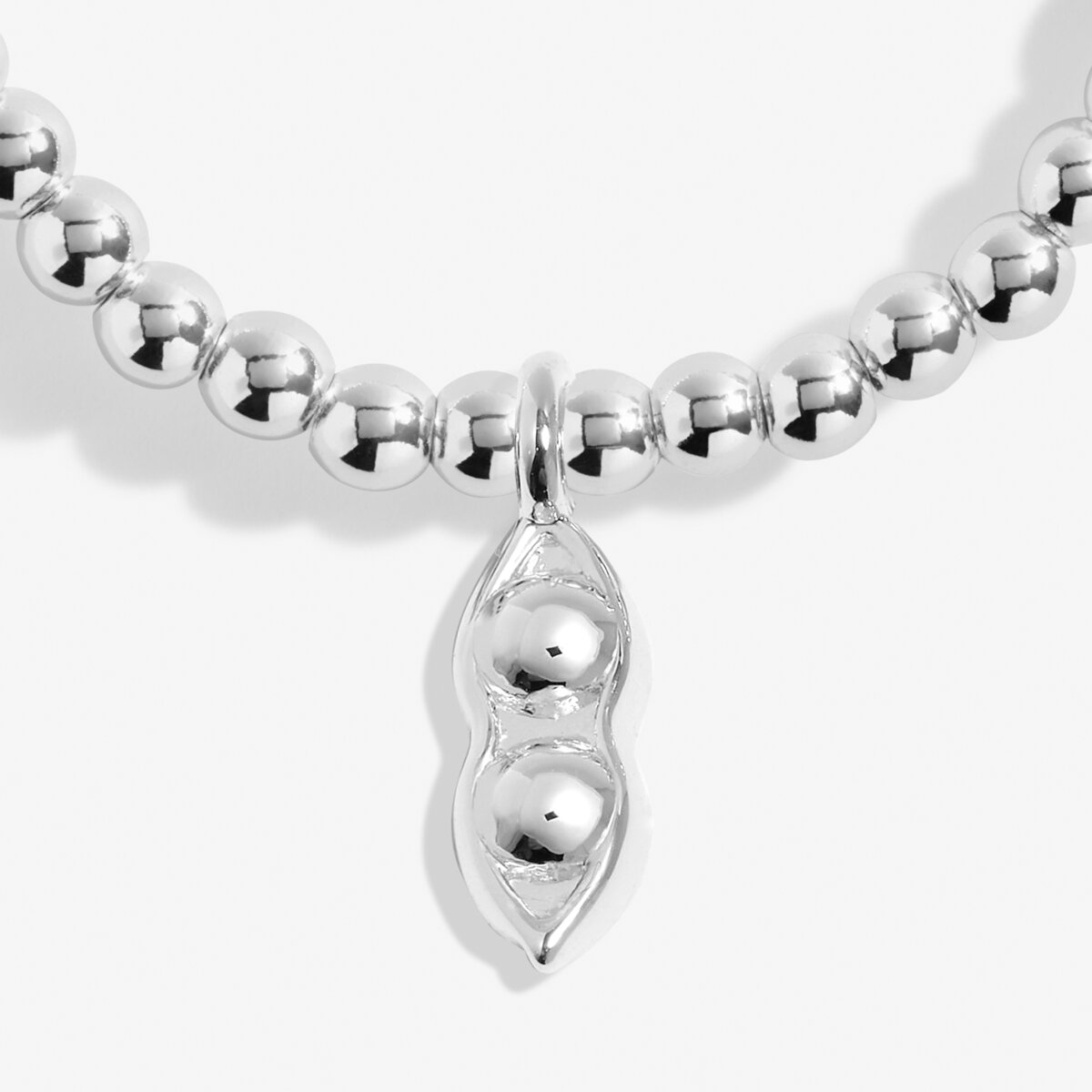 Joma beaded bracelet with peas in a pod charm