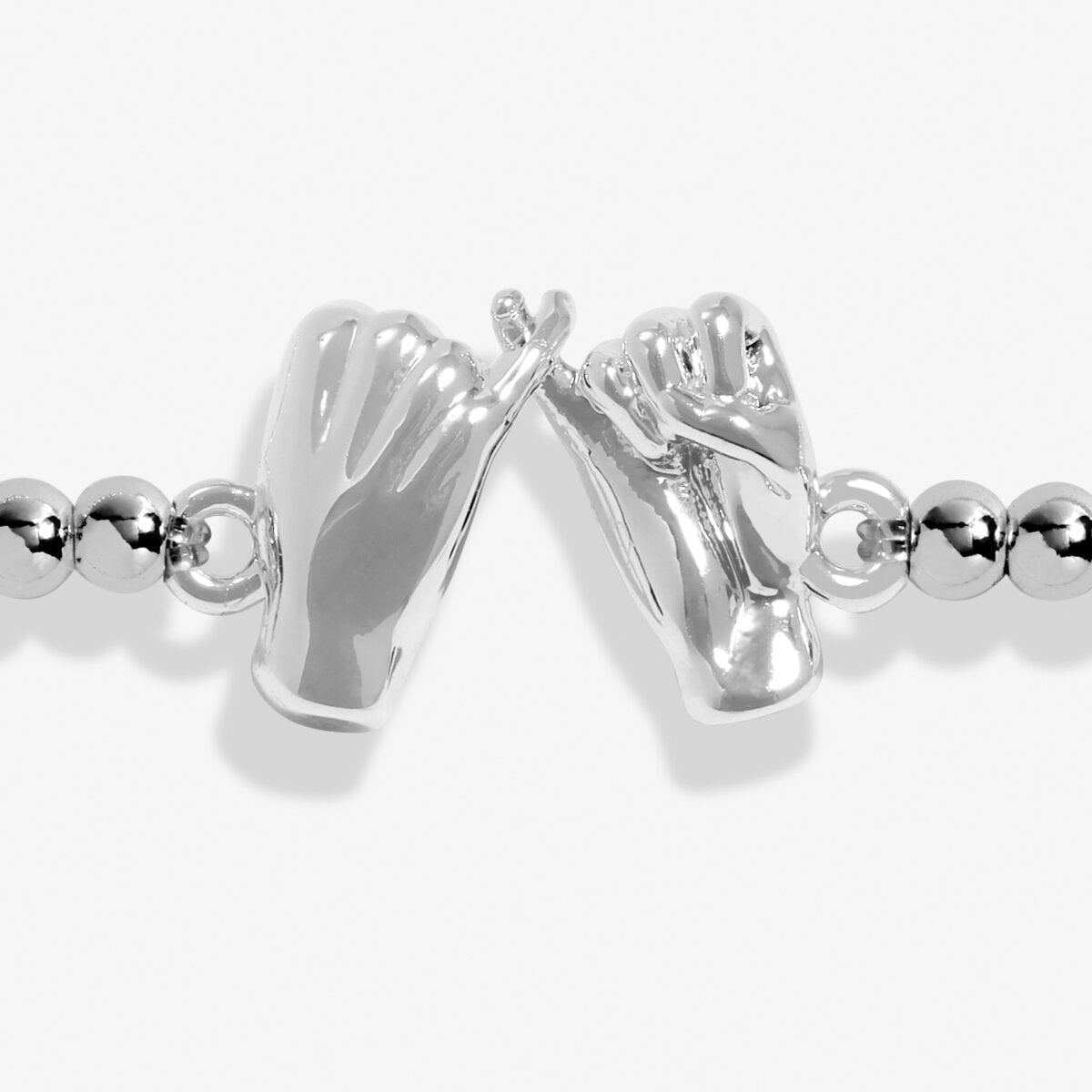 Joma beaded stretch bracelet with pinky promise charm