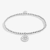 Joma beaded stretch bracelet with heart and disc charm