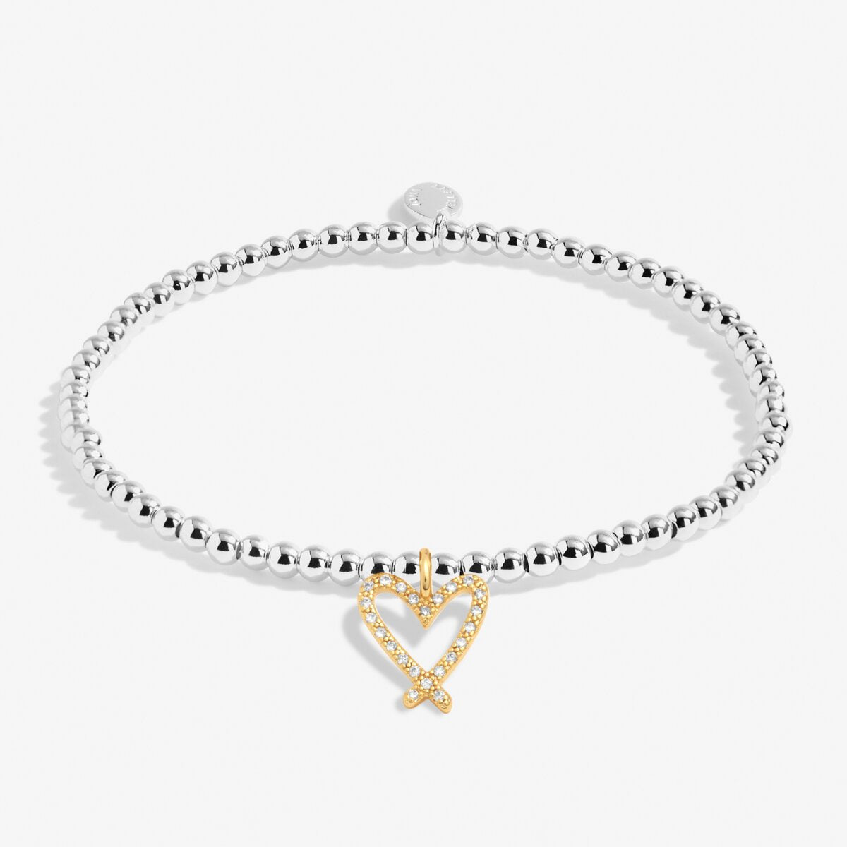 Joma beaded stretch bracelet with gold plated hanging heart charm