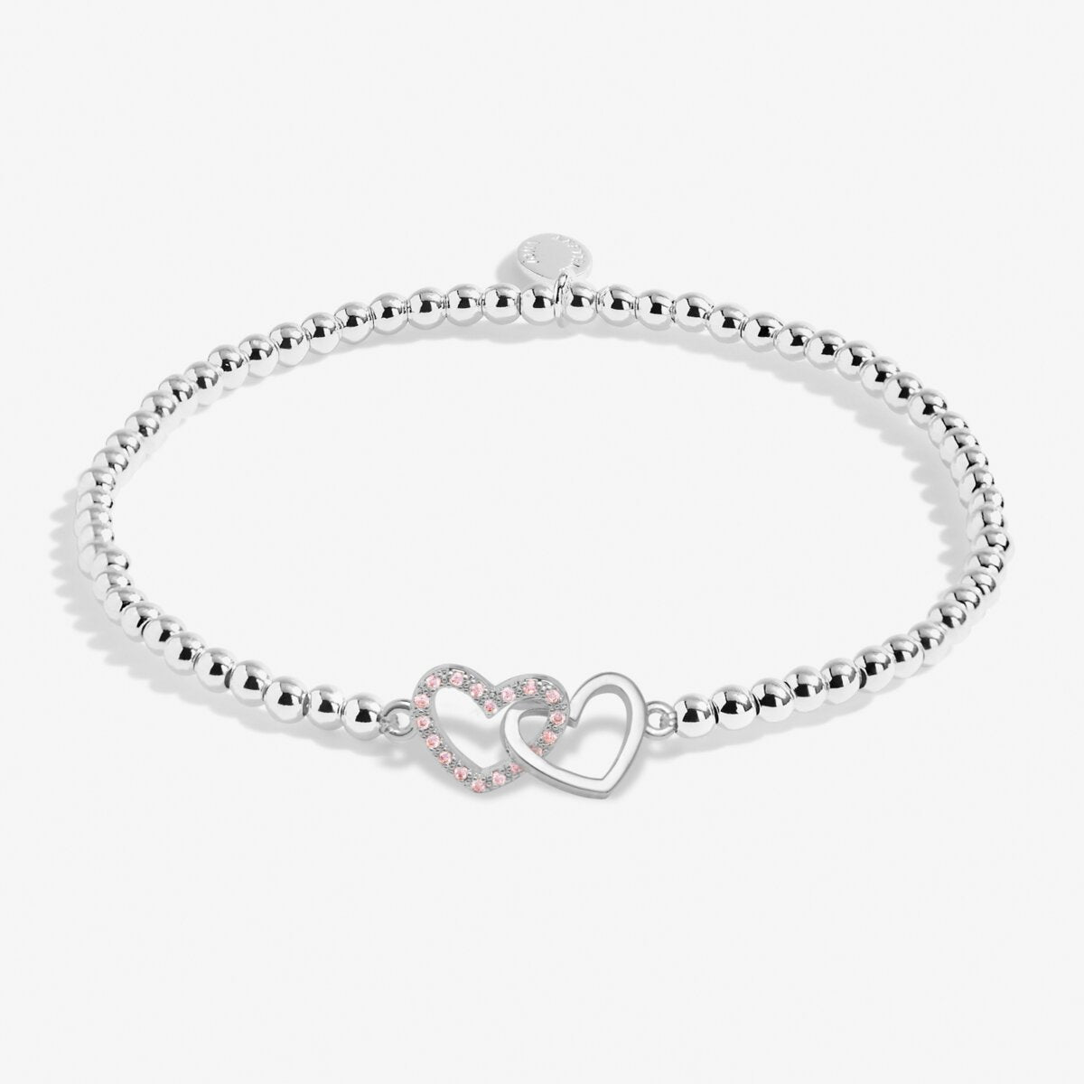 Joma beaded bracelet with interlocked heart charm