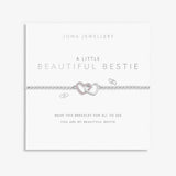 Joma beaded bracelet with interlocked heart charm