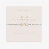 Joma Jewellery beaded bracelet with three interlinked hearts in silver, gold and rose gold presented on a blush pink sentiment card.