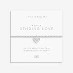 Silver plated 'Sending Love' stretch beaded Joma jewellery bracelet with hanging heart envelope charm on foil stamped sentiment card.