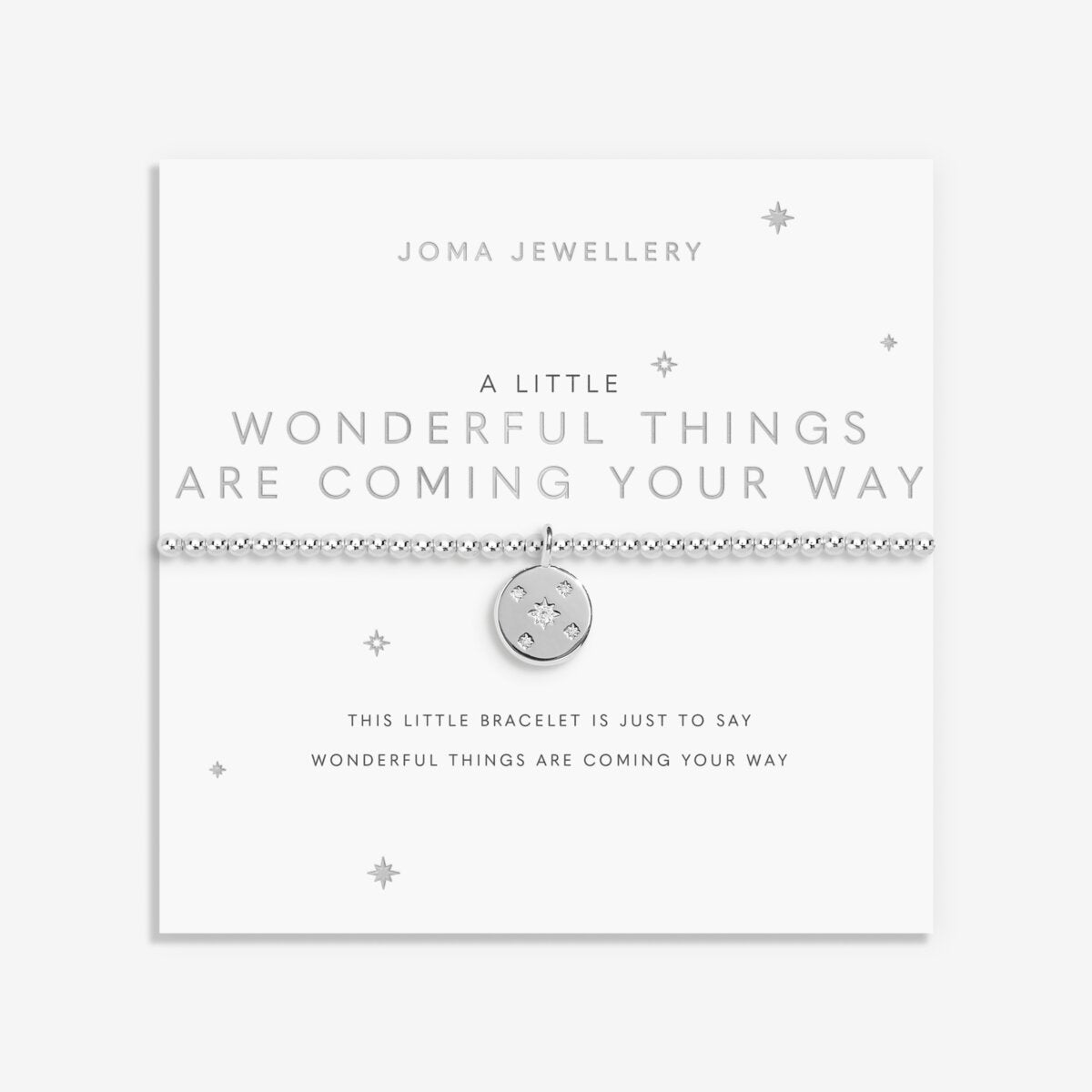 Joma jewellery beaded stretch bracelet with hanging solid disc charm with engraved sparkly stars presented on foil stamped sentiment card.