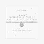 Joma jewellery beaded stretch bracelet with hanging solid disc charm with engraved sparkly stars presented on foil stamped sentiment card.
