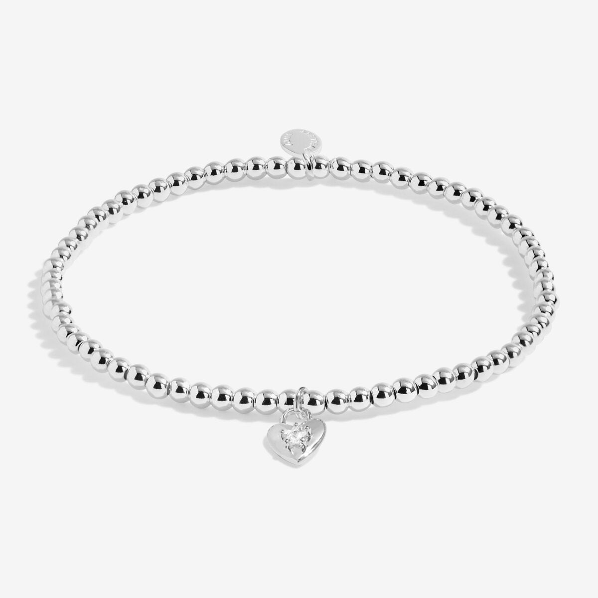 Joma Jewellery beaded stretch bracelet with padlock style heart charm with sparkly star detail presented on foil stamped sentiment card.