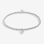 Joma Jewellery beaded stretch bracelet with padlock style heart charm with sparkly star detail presented on foil stamped sentiment card.